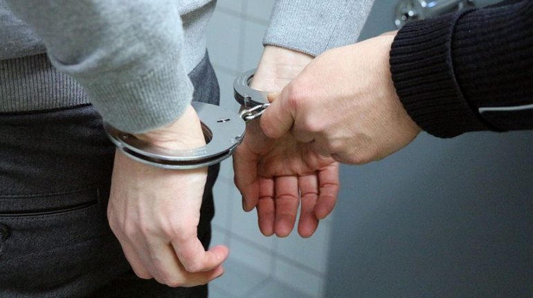 criminal being handcuffed