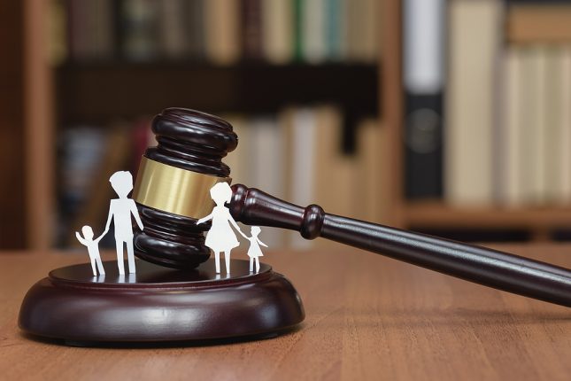 Gavel and a picture of a family. Sydney family law concept